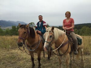 Mark and Lizzy agree that time on horseback is definitely more serene than battling GA 400 or I-285 rush hour traffic. Alpine, WY.